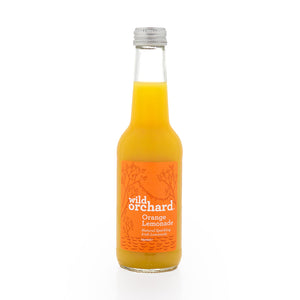 Bottle of Wild Orchard Orange Lemonade on a white background